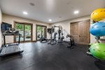 Fitness room off the pool area, with sliding doors for a perfect breeze